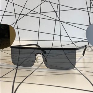 Blacked out shield sunglasses